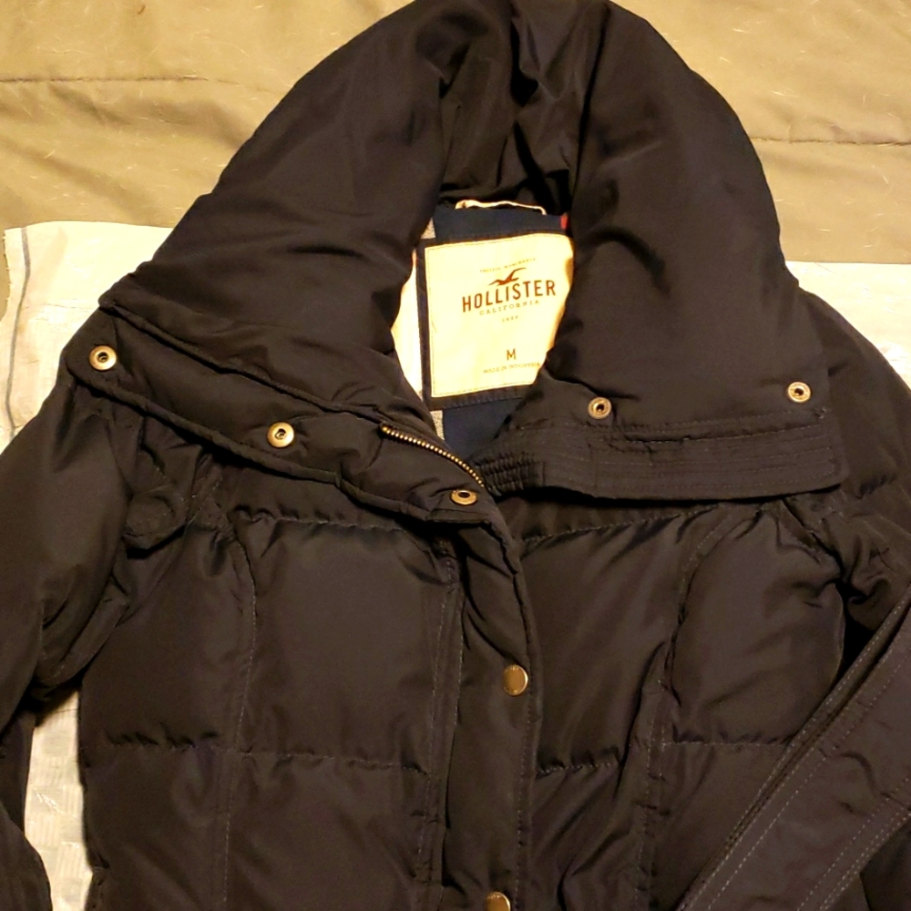 Hollister puffer Jacket with belt.